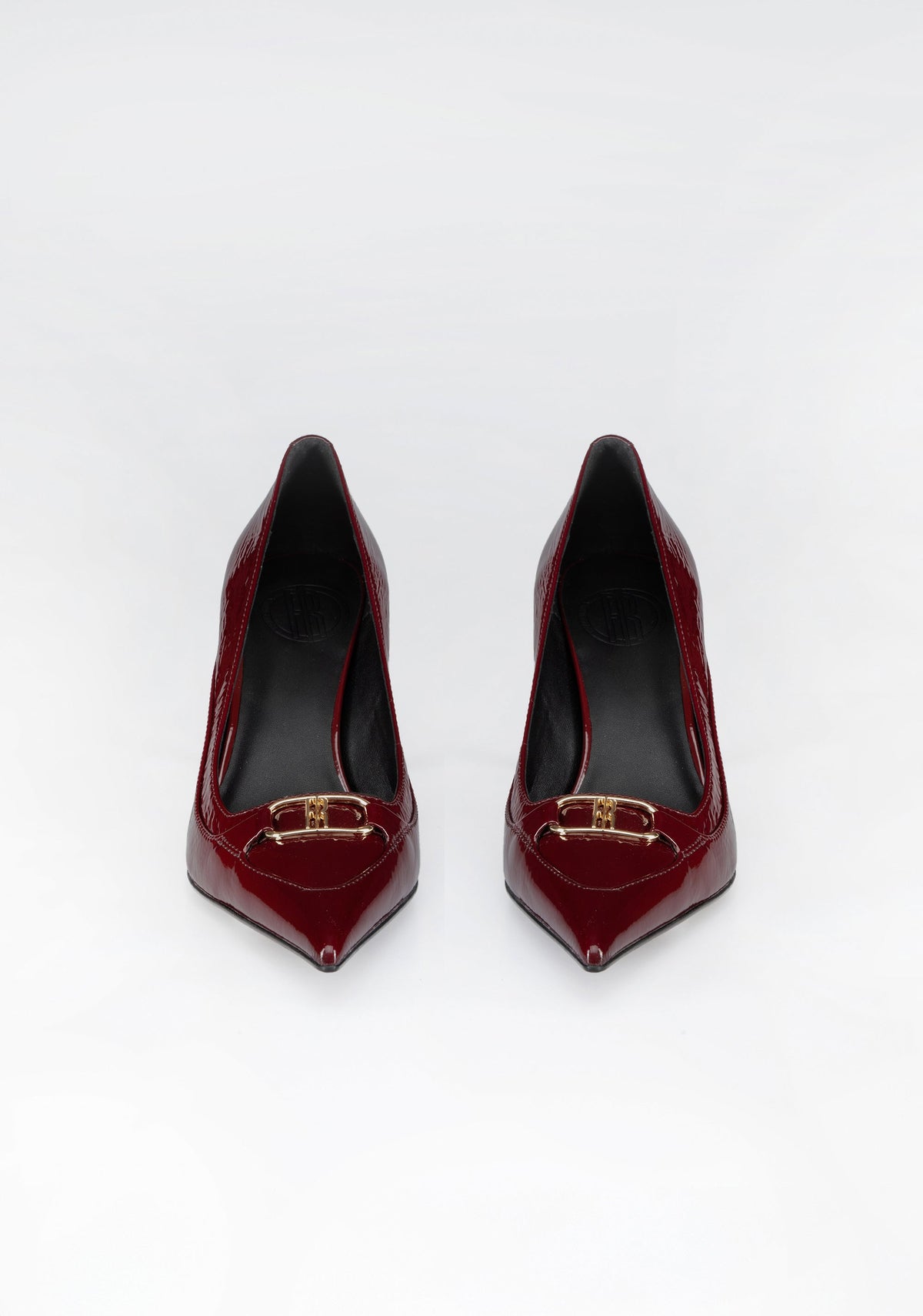 Pointed-Toe Patent Pumps with High Heel and Iconic Buckle