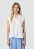 Sleeveless blouse with silk