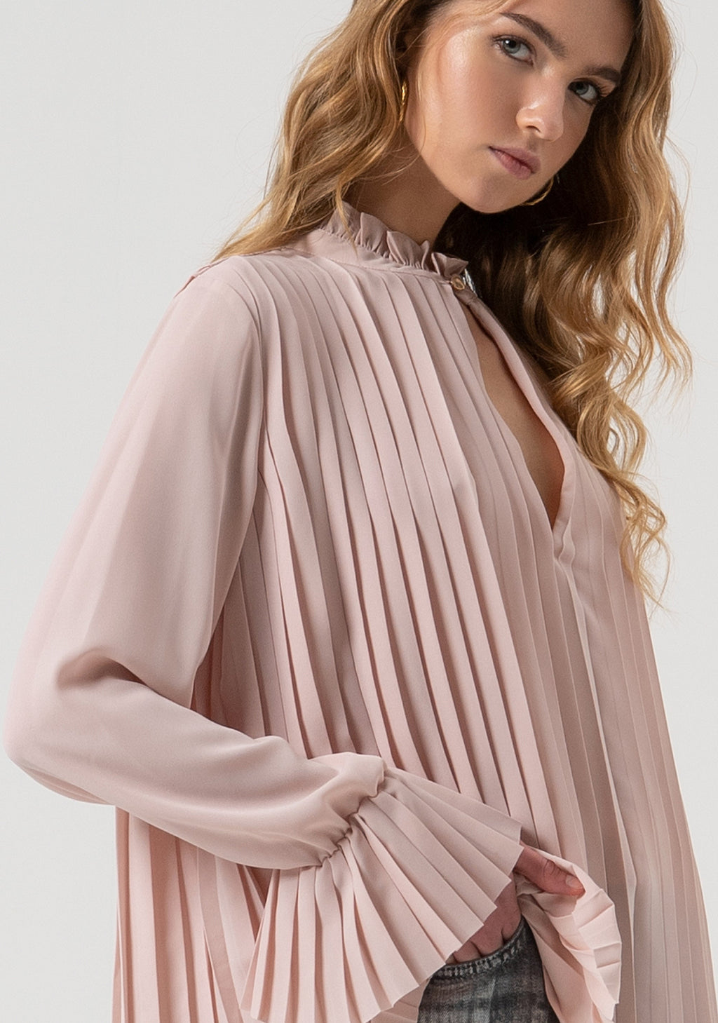 Zoe | Blusa de corte amplio confeccionada en tejido con efecto plisado